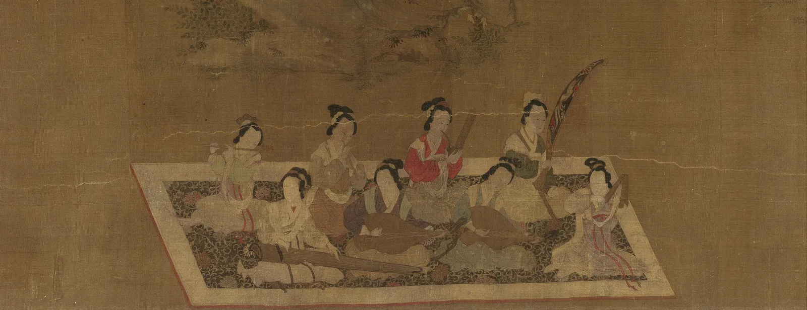 Detail from a Chinese silk handscroll of eight court ladies seated on a carpet playing musical instruments